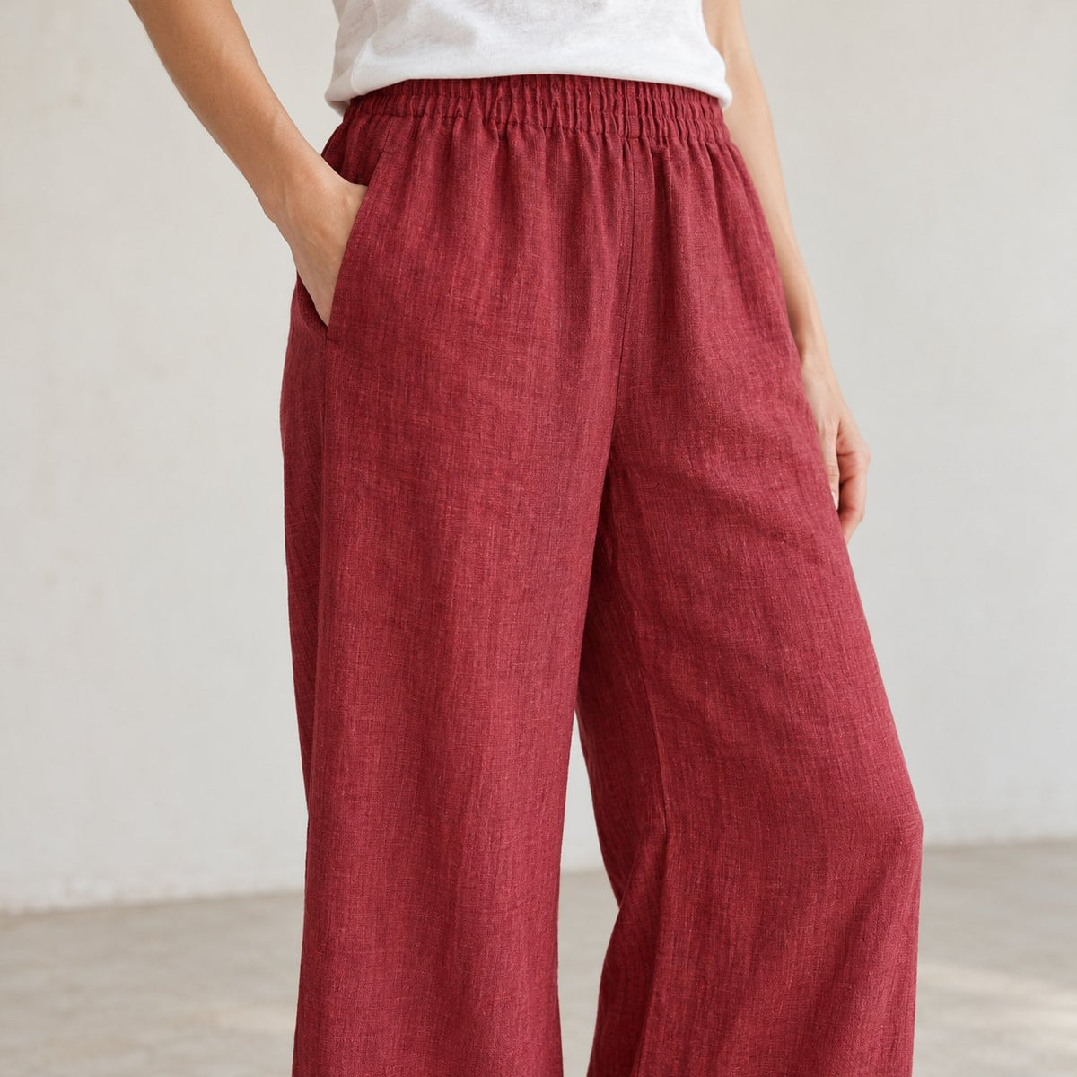 The Wide-Leg Linen Trouser in Dark Cherry Red, detail view