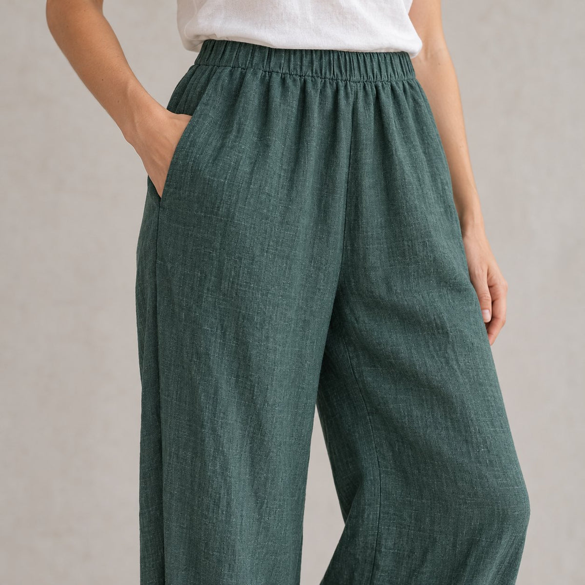 The Wide-Leg Linen Trouser in Dark Green, detail view