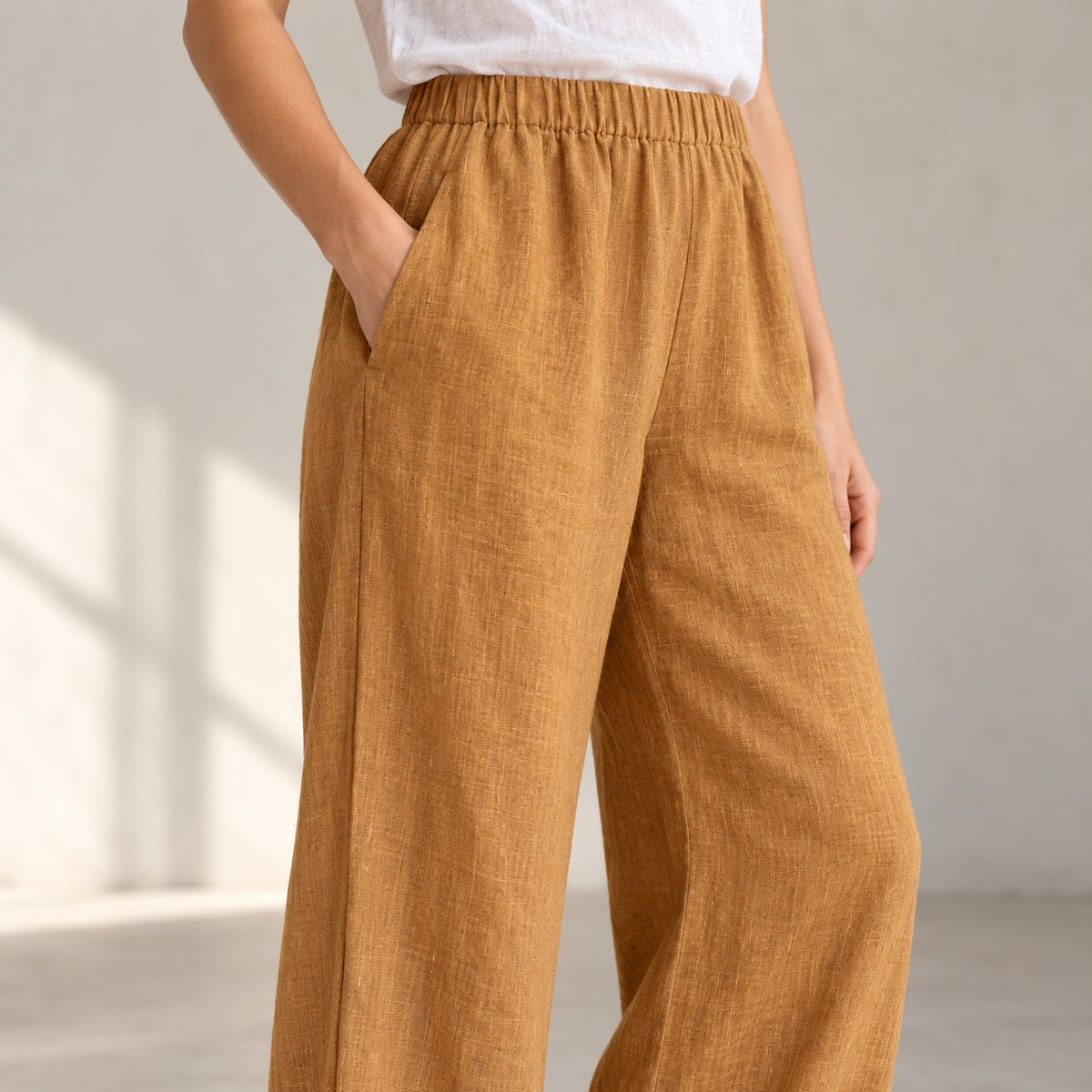 The Wide-Leg Linen Trouser in Mustard, detail view