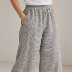 The Wide-Leg Linen Trouser in Natural Black Stripes, detail view