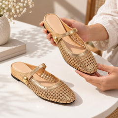 The Woven Mary Jane Mule, gold pair held in hand